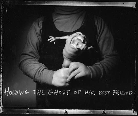 Holding_the_ghost_of_her_best_friend_001_sm